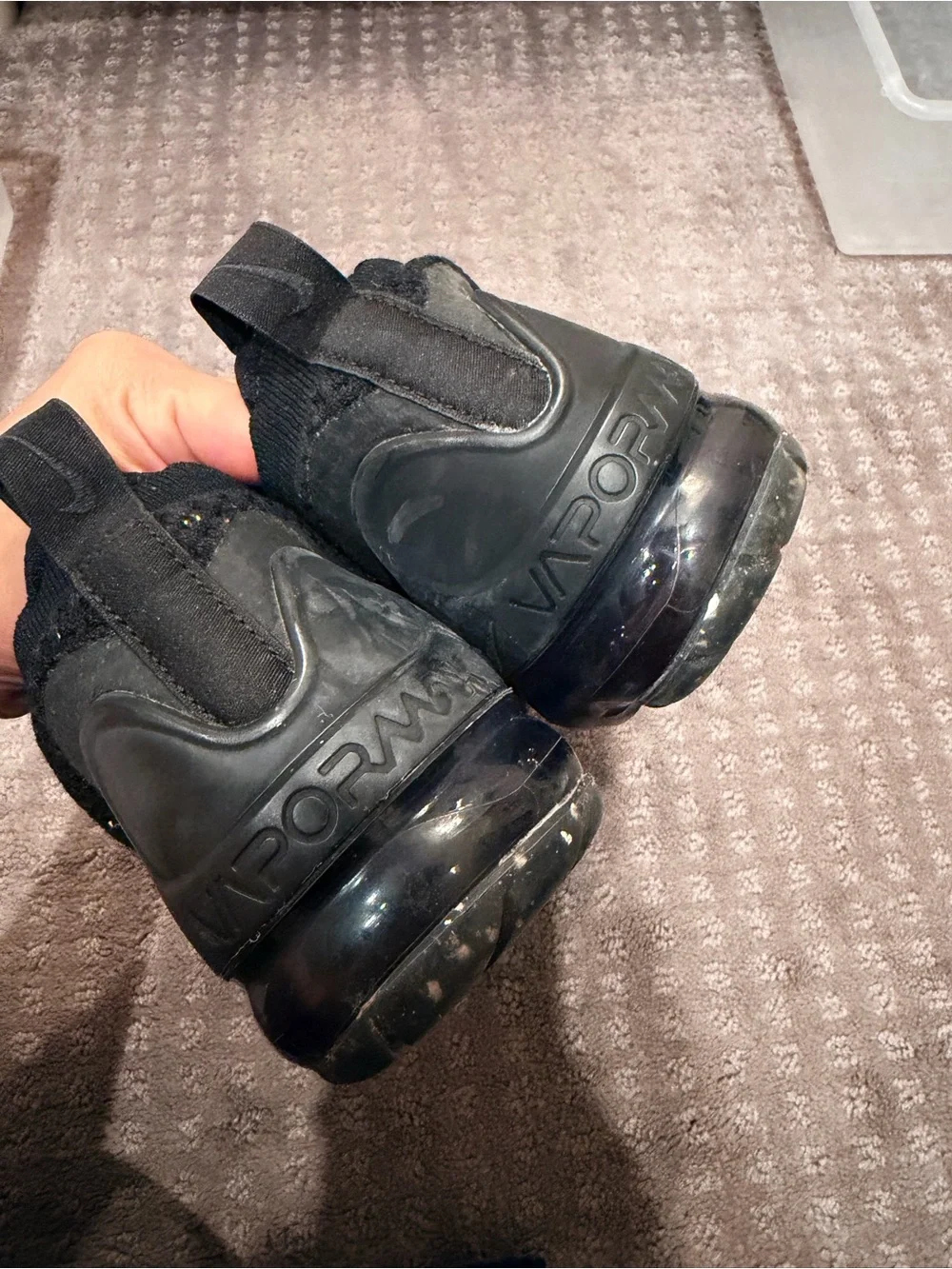 Nike Kids Black Flyknit-Style Sneaker with Subtle Gray Swoosh